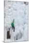 USA, Colorado, Uncompahgre National Forest. Climber ascends ice-encrusted cliff face.-Jaynes Gallery-Mounted Photographic Print
