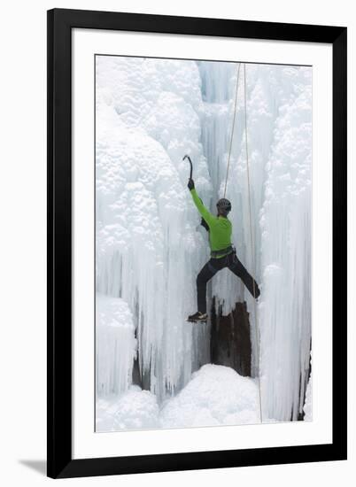 USA, Colorado, Uncompahgre National Forest. Climber ascends icy cliff face.-Jaynes Gallery-Framed Photographic Print