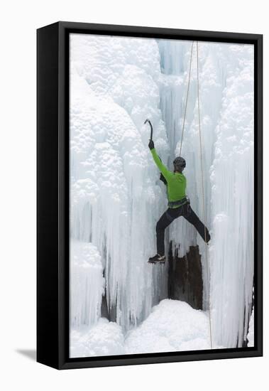 USA, Colorado, Uncompahgre National Forest. Climber ascends icy cliff face.-Jaynes Gallery-Framed Stretched Canvas