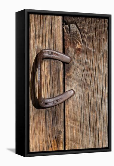 USA, Colorado, Westcliffe. Old wooden barn wall with bent horseshoe handle.-Cindy Miller Hopkins-Framed Stretched Canvas