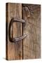 USA, Colorado, Westcliffe. Old wooden barn wall with bent horseshoe handle.-Cindy Miller Hopkins-Stretched Canvas