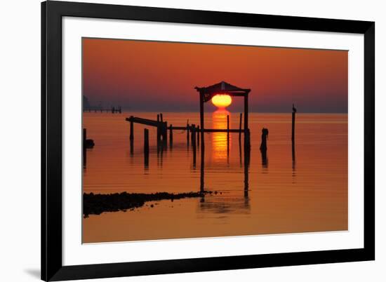 USA, Florida, Apalachicola, Sunrise at an old boat house at Apalachicola Bay.-Joanne Wells-Framed Premium Photographic Print