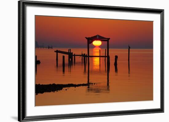 USA, Florida, Apalachicola, Sunrise at an old boat house at Apalachicola Bay.-Joanne Wells-Framed Premium Photographic Print