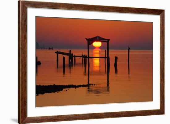 USA, Florida, Apalachicola, Sunrise at an old boat house at Apalachicola Bay.-Joanne Wells-Framed Premium Photographic Print