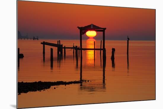 USA, Florida, Apalachicola, Sunrise at an old boat house at Apalachicola Bay.-Joanne Wells-Mounted Premium Photographic Print