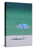 USA, Florida. Beach umbrella on the Emerald Coast, Destin.-Anna Miller-Stretched Canvas