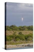 USA, Florida, Port Canaveral. A Space X rocket being launched from Cape Canaveral-Hollice Looney-Stretched Canvas