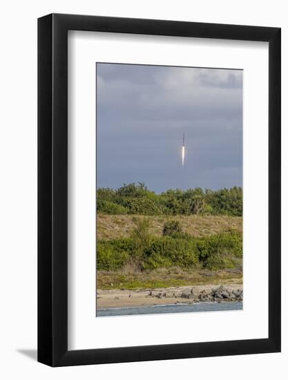 USA, Florida, Port Canaveral. A Space X rocket being launched from Cape Canaveral-Hollice Looney-Framed Photographic Print