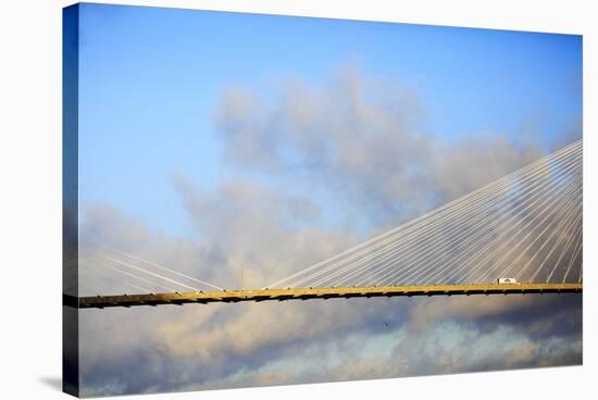 USA, Georgia, Savannah. Talmadge Memorial Bridge with truck crossing.-Joanne Wells-Stretched Canvas