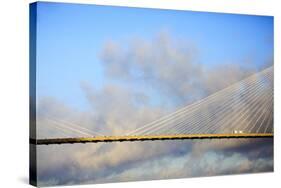 USA, Georgia, Savannah. Talmadge Memorial Bridge with truck crossing.-Joanne Wells-Stretched Canvas