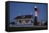 USA, Georgia, Tybee Island, Flag flying on lighthouse at Tybee Island.-Joanne Wells-Framed Stretched Canvas