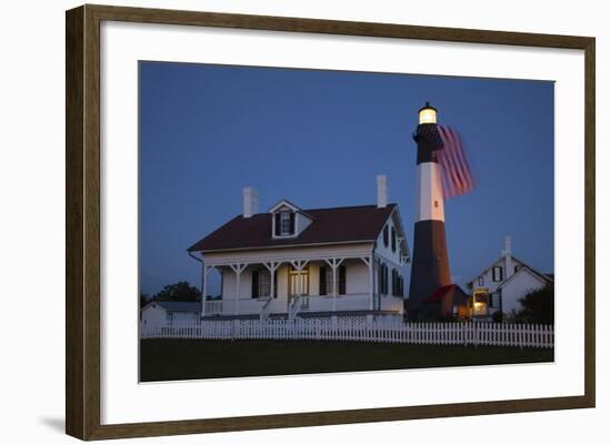 USA, Georgia, Tybee Island, Flag flying on lighthouse at Tybee Island.-Joanne Wells-Framed Photographic Print
