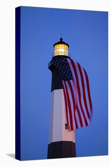 USA, Georgia, Tybee Island, Flag flying on lighthouse at Tybee Island.-Joanne Wells-Stretched Canvas