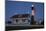 USA, Georgia, Tybee Island, Flag flying on lighthouse at Tybee Island.-Joanne Wells-Mounted Photographic Print