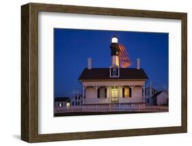 USA, Georgia, Tybee Island, Flag flying on lighthouse at Tybee Island.-Joanne Wells-Framed Photographic Print