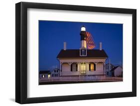 USA, Georgia, Tybee Island, Flag flying on lighthouse at Tybee Island.-Joanne Wells-Framed Photographic Print