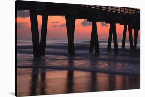 USA, Georgia, Tybee Island, Pier at Tybee Island beach at sunrise.-Joanne Wells-Stretched Canvas