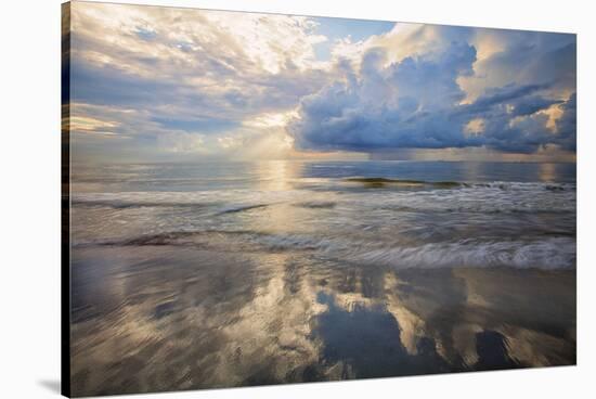 USA, Georgia, Tybee Island, Sunrise and reflections on Tybee Island.-Joanne Wells-Stretched Canvas