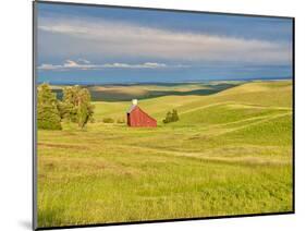 USA, Idaho, Palouse. Red barn with dark clouds and warm light-Terry Eggers-Mounted Photographic Print