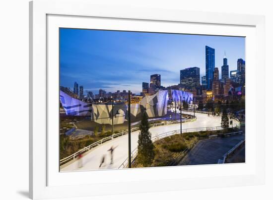 USA, Illinois, Chicago. The Maggie Daley Park Ice Skating Ribbon on a cold Winter's evening.-Nick Ledger-Framed Photographic Print