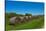 USA, Kansas, Minneapolis. Round bales of hay stacked in a row-Bernard Friel-Stretched Canvas