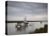 USA, Louisiana, Dulac, Bayou Fishing Boat by Lake Boudreaux-Walter Bibikow-Stretched Canvas