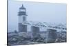 USA, Maine, Port Clyde. Marshall Point Lighthouse in the fog.-Walter Bibikow-Stretched Canvas