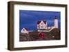 USA, Maine, York Beach, Nubble Light Lighthouse with Christmas decorations at dusk-Walter Bibikow-Framed Photographic Print