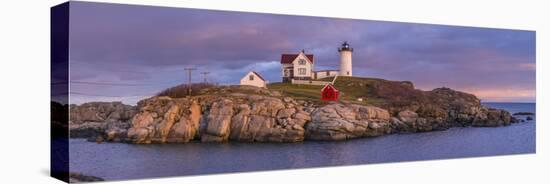 USA, Maine, York Beach, Nubble Light Lighthouse with Christmas decorations, dusk-Walter Bibikw-Stretched Canvas