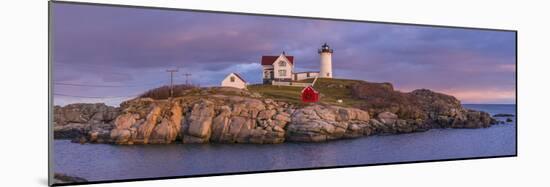 USA, Maine, York Beach, Nubble Light Lighthouse with Christmas decorations, dusk-Walter Bibikw-Mounted Photographic Print