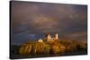 USA, Maine, York Beach, Nubble Light Lighthouse with Christmas decorations, sunset-Walter Bibikow-Stretched Canvas