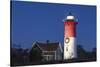 USA, Massachusetts, Cape Cod, Eastham. Nauset Light with Christmas wreath at dawn.-Walter Bibikow-Stretched Canvas