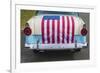 USA, Massachusetts, Essex. Antique cars, detail of 1950's-era Ford draped with US flag-Walter Bibikow-Framed Photographic Print