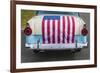 USA, Massachusetts, Essex. Antique cars, detail of 1950's-era Ford draped with US flag-Walter Bibikow-Framed Photographic Print