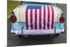 USA, Massachusetts, Essex. Antique cars, detail of 1950's-era Ford draped with US flag-Walter Bibikow-Mounted Photographic Print