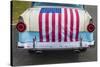 USA, Massachusetts, Essex. Antique cars, detail of 1950's-era Ford draped with US flag-Walter Bibikow-Stretched Canvas