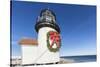 USA, Massachusetts, Nantucket Island, Brant Point Lighthouse with a Christmas wreath.-Walter Bibikow-Stretched Canvas