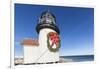 USA, Massachusetts, Nantucket Island, Brant Point Lighthouse with a Christmas wreath.-Walter Bibikow-Framed Photographic Print