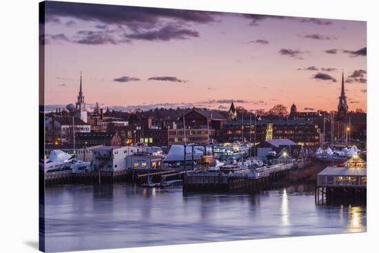 USA, Massachusetts, Newburyport, skyline from the Merrimack River at dusk-Walter Bibikow-Stretched Canvas