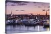 USA, Massachusetts, Newburyport, skyline from the Merrimack River at dusk-Walter Bibikow-Stretched Canvas