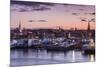USA, Massachusetts, Newburyport, skyline from the Merrimack River at dusk-Walter Bibikow-Mounted Photographic Print