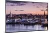 USA, Massachusetts, Newburyport, skyline from the Merrimack River at dusk-Walter Bibikow-Mounted Photographic Print