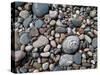 USA, Michigan. Polished pebbles on the shore of Lake Superior.-Anna Miller-Stretched Canvas