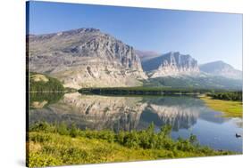 USA, Montana, Glacier Mountains Reflected on Lake Sherbourne-Trish Drury-Stretched Canvas