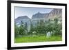 USA, Montana, Glacier National Park. Mountain goat grazing in meadow.-Jaynes Gallery-Framed Photographic Print