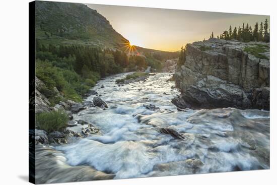 USA, Montana, Glacier National Park. Swiftcurrent Falls stream at sunrise.-Jaynes Gallery-Stretched Canvas