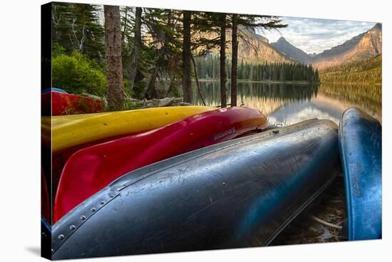 USA, Montana, Glacier National Park. Two Medicine Lake with Canoes in Foreground-Rona Schwarz-Stretched Canvas