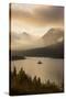 USA, Montana, Glacier NP. Sunrise pierces clouds over St. Mary Lake.-Don Grall-Stretched Canvas