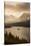 USA, Montana, Glacier NP. Sunrise pierces clouds over St. Mary Lake.-Don Grall-Stretched Canvas