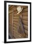 USA, Montana, Livingston, cowboy hat and chaps hanging on barn wall.-Merrill Images-Framed Photographic Print